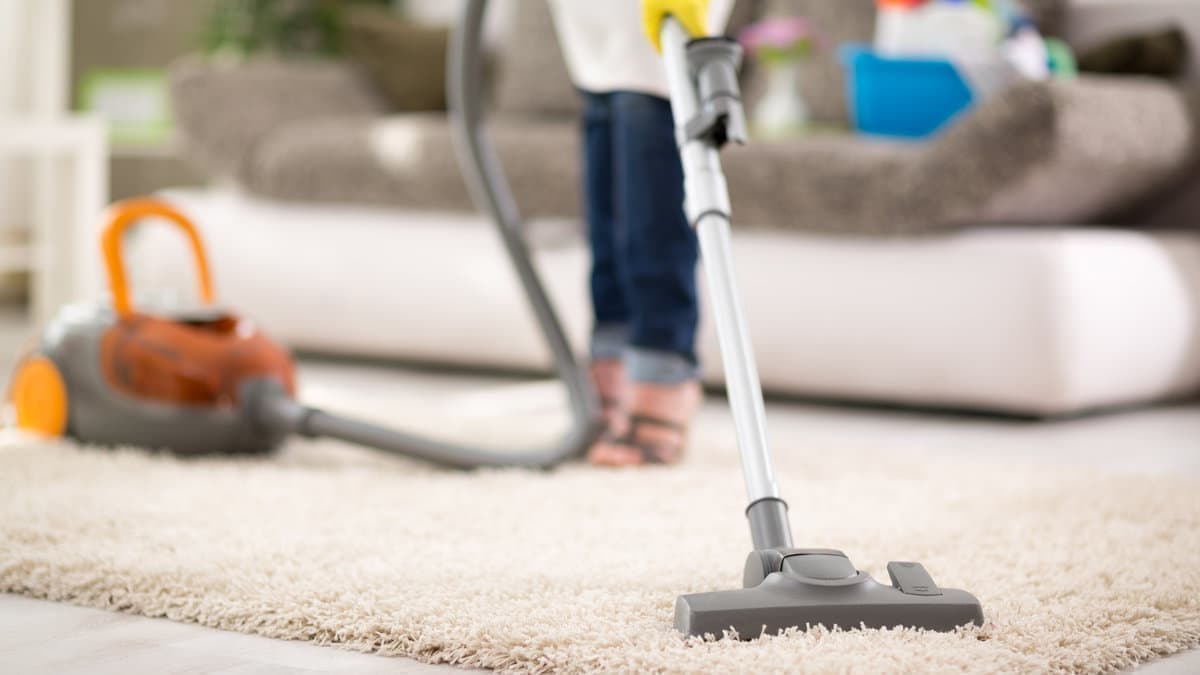 Meticulous European-style cleaning service in Greater Seattle Area - vacuuming for spotless results.